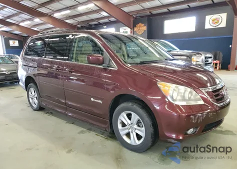 2010 Honda Odyssey Touring z USA, uszkodzony, nr VIN 5FNRL3H90AB063475